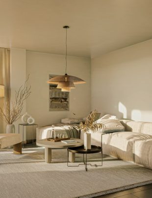 a living room filled with furniture and a large window